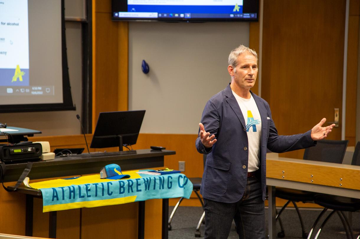 Andrew Katz of Athletic Brewing speaks to students at Fuqua